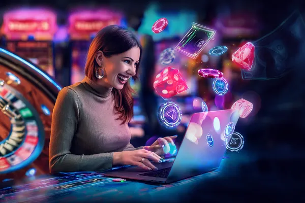 KKDB Games — Explore our rich library of casino classics A woman smiling while playing online games on her laptop, surrounded by neon casino elements, showcasing KKDB’s diverse game collection.